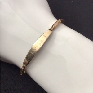 Gold Engraved Stretch Bracelet Says Carolyn